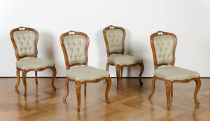 Set of four French dining chairs. Carved walnut with cabriole legs and green fabric