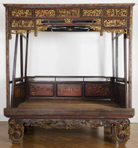 CHINESE OPIUM BED: Black & red lacquered finish with gilt highlights. 20th century