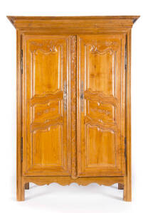 French 19th Century armoire with carved floral panelled doors. Height 211cm, width 150cm, depth 63cm