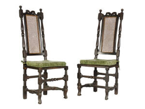 A pair of Carolean style oak caned back chairs, English 17th century