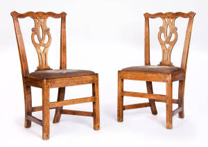 A pair of 19th century English oak dining chairs with tapestry seats.&nbsp;