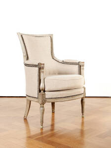 French timber framed armchair with painted finish and beige upholstery.
