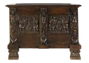 A heavily carved oak coffer, incorporating 16th century elements