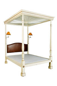 A Georgian style cream and brown painted four poster bed, with adjustable candle branches , 223cm high, 148cm wide and 193cm deep