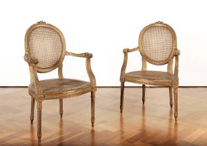 A pair of louis XVI style gilt wood caned bergeres, French 19th century