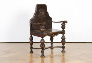 English carved oak armchair, early 20th century.