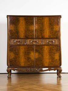 COCKTAIL CABINET: Burr walnut with carved drawer fronts & cabriole legs. 140 x 122 x 40cm