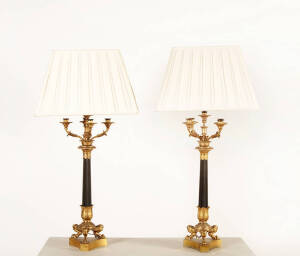 A pair of French gilt bronze decorative table lamps with shades. Tri-form bases with claw feet & 4 branch candelabra tops. 90cm
