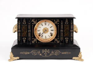 American mantle clock: Ebonized metal case, late 19th century.