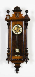 WALL CLOCK: Antique walnut case with enamel dial. 92cm