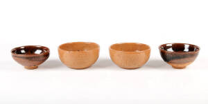 A pair of red stoneware incense bowls, covered in a greenish glaze,&nbsp;11cm diameter, and a pair of brown glazed stoneware bowls 10cm diameter.