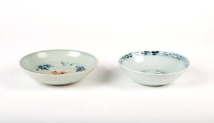 A Provincial Ming circular bowl decorated with calligraphy 11cm diameter and another dish with carved fish design 12cm diameter