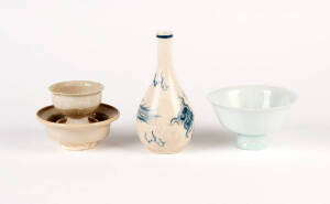 A Qingbai cup and stand, Song Dynasty, 5cm high and 11cm diameter, and a Korean style blue and white phoenix vase 16cm high, and a pale blue glazed white porcelain stem cup, 12cm diameter, 7cm high