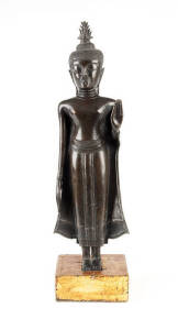 A Thai bronze figure of a standing Buddha