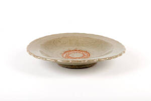 A Longxuan celadon stoneware barbed circular dish, 15th century