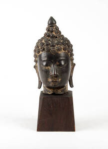 A Thai bronze head of Buddha, &nbsp;20th century, 19c high, 28cm high overall, wood stand, Provenance: David Jones Art Gallery, Sydney&nbsp;
