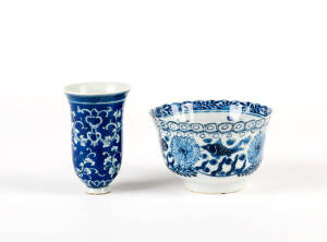 A Kangxi style blue and white porcelain bowl,&nbsp;10cm diameter and a foliate decorated blue and white cup 9cm high