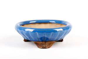 A Chinese lavender blue glazed circular bowl, 23cm diameter