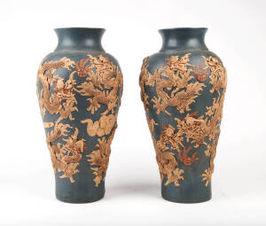 A pair of large Chinese applied stoneware ovoid vases decorated with dragons 37cm high