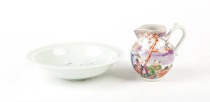 A Chinese export porcelain famille rose cream jug, Qianlong 18th century, 10cm high and a Qingbai twin fish dish 18cm diameter