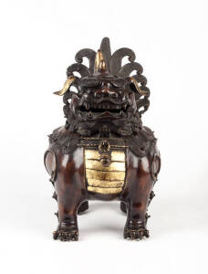 A parcel-gilt bronze mythical beast censer, 26cm high
