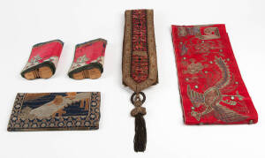 A Chinese red silk and gold thread dragon robe and a collection of various Chinese and Indonesian textiles