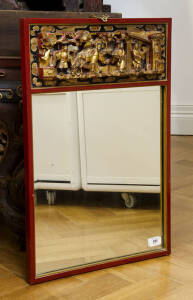 A red and gilt decorated carved wood rectangular wall mirror, early 20th century