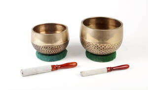 Two chinese polished bronze Gongs with beaters