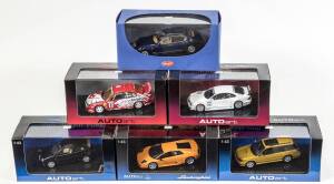 AUTO ART: 1:43 group of model cars including Ford Falcon XB GT Coupe (52742) – Yellow; and, Mitsubishi Pajero Evo (57203) – Red; and, Holden Racing Team HRT VX 2001 (60161) – M Skaife #1. All mint in original perspex display case. (25 items)