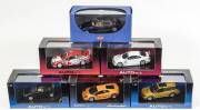 AUTO ART: 1:43 group of model cars including Ford Falcon XB GT Coupe (52742) &ndash; Yellow; and, Mitsubishi Pajero Evo (57203) &ndash; Red; and, Holden Racing Team HRT VX 2001 (60161) &ndash; M Skaife #1. All mint in original perspex display case. (25 items)