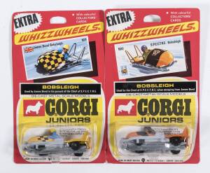 CORGI JUNIORS: Early 1970s scarce pair of ‘Whizzwheels’ James Bond Bobsleighs consisting of James Bond Bobsleigh (1011) – Yellow; and S.P.E.C.T.R.E Bobsleigh (1012) – Orange. Both mint and unopened in original yellow and red blister packs. (2 items)