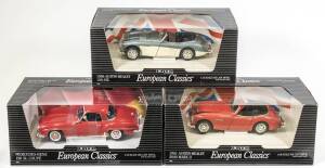 ERTL: Group of 'European Classic Cars' including 1956 Austin-Healey 100-Six (7459) – Blue and White; and, Mercedes-Benz 190 SL Coupe (7465) – Red; and, 1961 Austin-Healey 3000 Mark II (7460) – Red. All mint in original cardboard windowed display boxes. (3