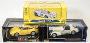 ERTL: 1:18 'American Muscle Cars' including 1970s Plymouth Aar&rsquo;Cuda (7449) &ndash; Green; and, 1971 Buick GSK (7470) &ndash; Black; and, 1969 Camaro Z/28 (7451) - Red. All mint in original cardboard windowed boxes. (3 items)