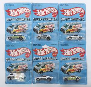 HOTWHEELS: Group of Vintage late 1970s ‘Super Chromes’ including Mustang Stocker (2205); and, Super Van (9205); and, Heavy Chevy (9212). All mint and unopened on original cardboard blister packs. (7 items)