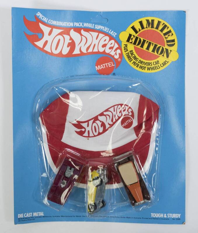 HOTWHEELS: 1978 Limited Edition Special Combination Pack (2300) Consisting of racing drivers cap and three 1978 Hot Wheels cars. Mint and unopened on original cardboard blister pack, slight unpeeling of blister pack from cardboard. 