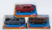HOTWHEELS: 1:25 group of model cars including Fiat Panda (6785); And, Volvo 343 (6756); And, Citroen Visa (6767). All mint in original plastic display cases. (3 items)