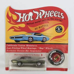 HOTWHEELS: 1968 Redline Custom Eldorado (6218) – Spectral Flame Olive Green with Black plastic roof and White Interior. This model is part of the Sweet 16, the first Hot Wheels models to ever be produced. Mint and unopened in original flame blister pack.