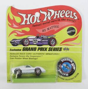 HOTWHEELS: 1968 Redline Ford J-Car (6214) – Enamel White with Black Interior. This model is part of the Grand Prix Series, the first Hot Wheels models to ever be produced. Mint and unopened in original flame blister pack.