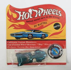 HOTWHEELS: 1969 Redline Twinmill (6258) – Spectral Flame Aqua with White Interior. Mint and unopened in original flame blister pack, plastic bubble pack slightly squished but totally intact.