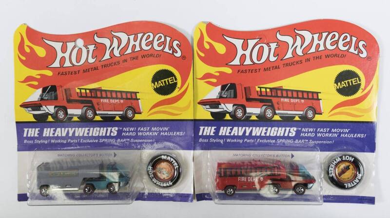 HOTWHEELS: 1970 Pair of Redline ‘The Heavyweights’ including Moving Van (6455) – Spectral Flame Aqua Cab and Grey Trailer; and, Fire Engine (6454) - Spectral Flame Red Cab and Plastic Red Cab. Both mint and unopened in original flame blister packs. (2 ite