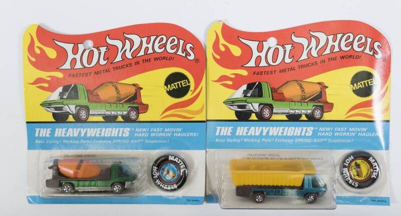 HOTWHEELS: 1970 Pair of Redline ‘The Heavyweights’ including Dump Truck (6453) – Spectral Flame Aqua Cab and Yellow Plastic Dumper; and, Cement Mixer (6454) - Spectral Flame Green Cab and Orange Mixer. Both mint and unopened in original flame blister pack