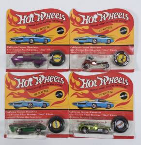 HOTWHEELS: 1971 group of Redlines including Jet Threat (6179) – Spectral Flame Green; and, What-4 (6001) – Spectral Flame Magenta; and, The Hood (6175) – Spectral Flame Green. All mint and unopened in original flame blister packs. (4 items)