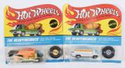 HOTWHEELS: 1971 pair of Redline &lsquo;The Heavyweights&rsquo; including Fuel Tanker (6018) &ndash; Enamel White Cab and White Plastic Trailer; and, Waste Wagon (6192) &ndash; Spectral Flame Olive Cab with Orange Plastic Trailer. All mint and unopened in original flame blister p