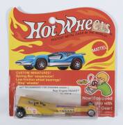 HOTWHEELS: 1972 very rare Redline Rear Engine Snake (5856) – Yellow. This model was part of the years where there were low sales and a drastic reduction in new casting. In 1972 there were only 7 new casting made. This mode is mint and unopened in original