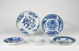 A collection of five Chinese blue and white saucer dishes