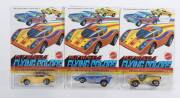 HOTWHEELS: 1975 group of Redline ‘Flying Colors’ including Sand Drifter (7651) – Yellow; and, American Victory (7662) – Blue; and, Porsche Carrera (7648) - Yellow. All mint and unopened in original rectangular white blister pack. (3 items)