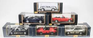 MAISTO: 1:18 group of model cars including 1990 BMW 850i (805B) – Black; and, 1955 Mercedes-Benz 300S (806B) – Black; and, 1995 Ferrari F50 (31822) – Red. All mint in original cardboard windowed boxes. (9 items)