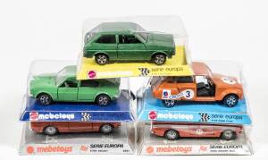 MEEBETOYS: Group of model cars including Ford Escort (8551)- Orange; and, Volkswagen Golf (A87); and, Alfa Sud Sprint (A105) – Red. All mint in original plastic bubble packs. (14 items) 