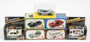 MEBETOYS: Group of model cars including Ferrari 512S Pininfarina (A100) – Red; and, Chaparral 2 J Can Am (6628) – Orange and White; and, Volkswagen Golf (A114) – ADAC. All cars mint in original packaging. (29 items)