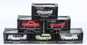 MINICHAMPS: 1:43 Group of Opel Model Cars including 1966 Opal Rekord 'C' Break (46111) - Blue; and, 1966 Opal Commodore 'A' (46161) – Dark Red; and, 2000 Opel Corsa (40302) – Black. All mint in original perspex display case. (32 items)
